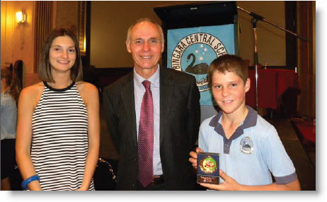 2013 Dux of the School, Ellen Odell pictured with Principal Mark Vale and primary 2014 Dux, Josh Armstrong.