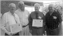 Bruce Batterham, John Wearne, Ron Irlam and Peter Jones celebrate Bruce’s and Ron’s Life Membership