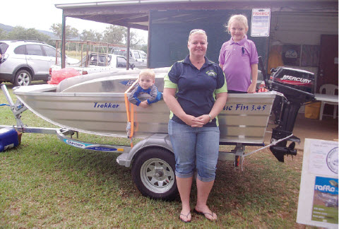 Johnson family with their winning boat