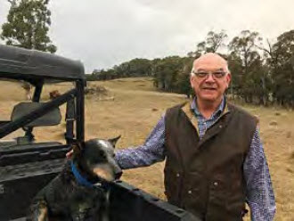 Former Bingara locals, Don Capel and his dog, Dougal, at their Oberon property.