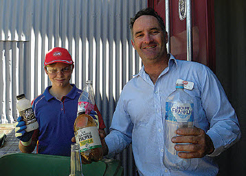 Seth Keam and John Bishton show what type of containers are eligible for the Return and Earn container deposit scheme.