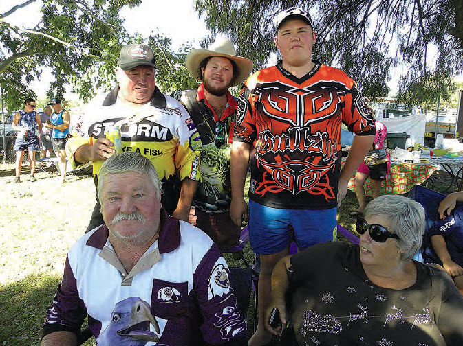 Pally fishers, Merv Ford, Jeremy McNamara, Luke Hobday and in front, Greg Macey, with support crew await the presentations at the Bingara Hatchery on Sunday.