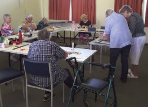 Card makers hard at work: Barb Leech shared her knowledge with very keen participants at the Bingara U3A workshop last Thursday.