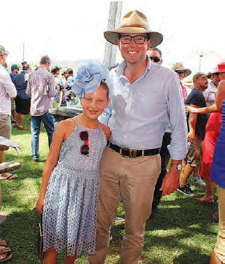 Young Miss Racegoer, Scarlett Standerwick, is congratulated by Member for Northern Tablelands, Adam Marshall.