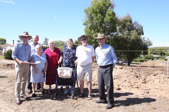 Northern Tablelands MP Adam Marshall, left, Gwydir Shire Mayor John Coulton and Naroo Aged Care Hostel residents, Julie Selby, Jean Williams, Joyce Mclymont, Brian Staunton and Doug Wilson in front of where the new all-abilities park will be constructed.