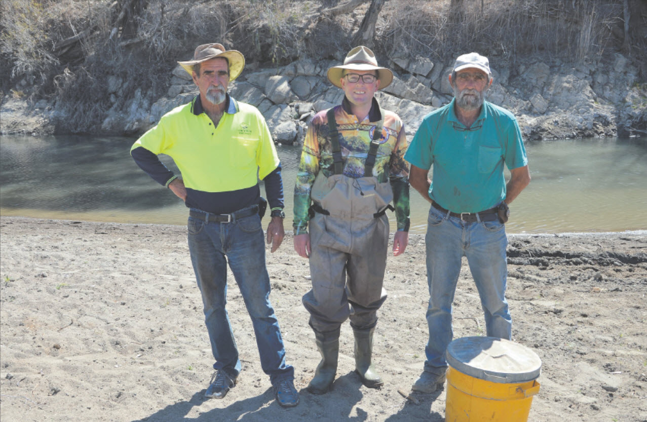 Mick, left, and Peter Walton with Northern Tablelands MP Adam Marshall at one of the Horton River’s water pools about to rescue some fish